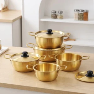 Premium gold stainless steel cooking pot set with lids, Korean style ramen pots in various sizes for B2B wholesale and OEM.
