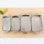 Wholesale rectangular stainless steel roasting pans and deep baking trays with handles, multiple sizes for commercial catering and kitchen storage.