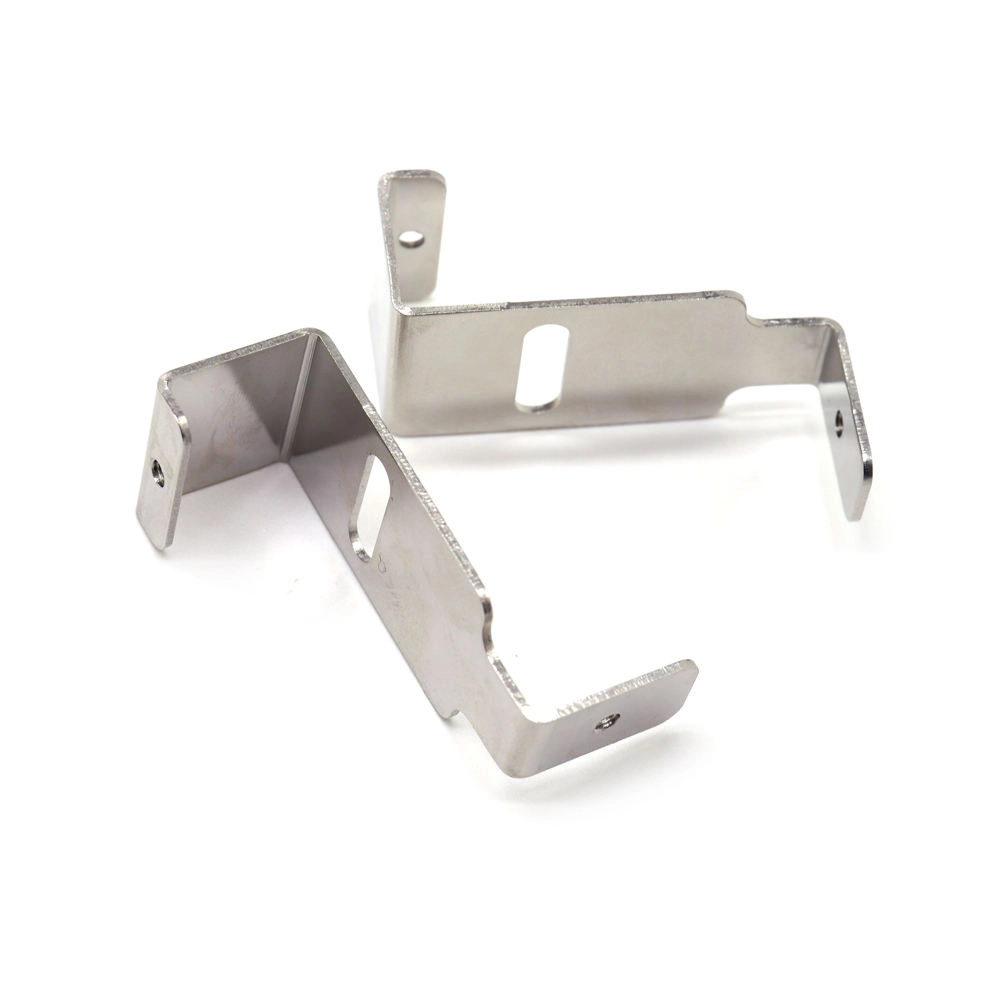 Custom stainless steel stamping brackets for industrial assembly, manufactured by OEM metal fabrication supplier.