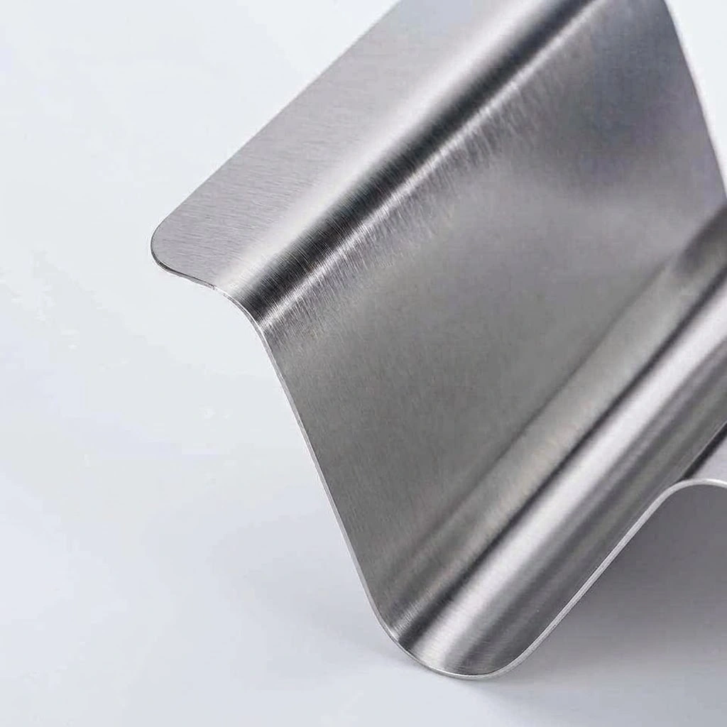 Close-up of smooth rounded edges on OEM stainless steel taco stand, ensuring safe handling in commercial kitchens.